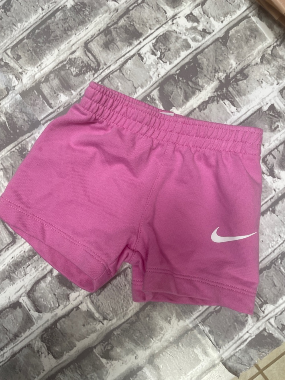 Nike Pink Girls' Athletic Shorts with White Swoosh